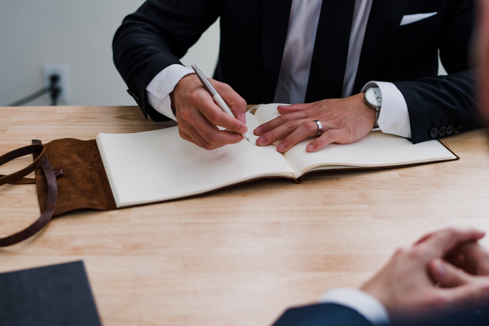 client with tax consultant at table client with tax consultant at table