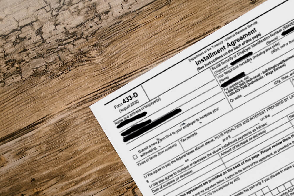 irs installment agreement on wooden table mockup irs installment agreement on wooden table mockup