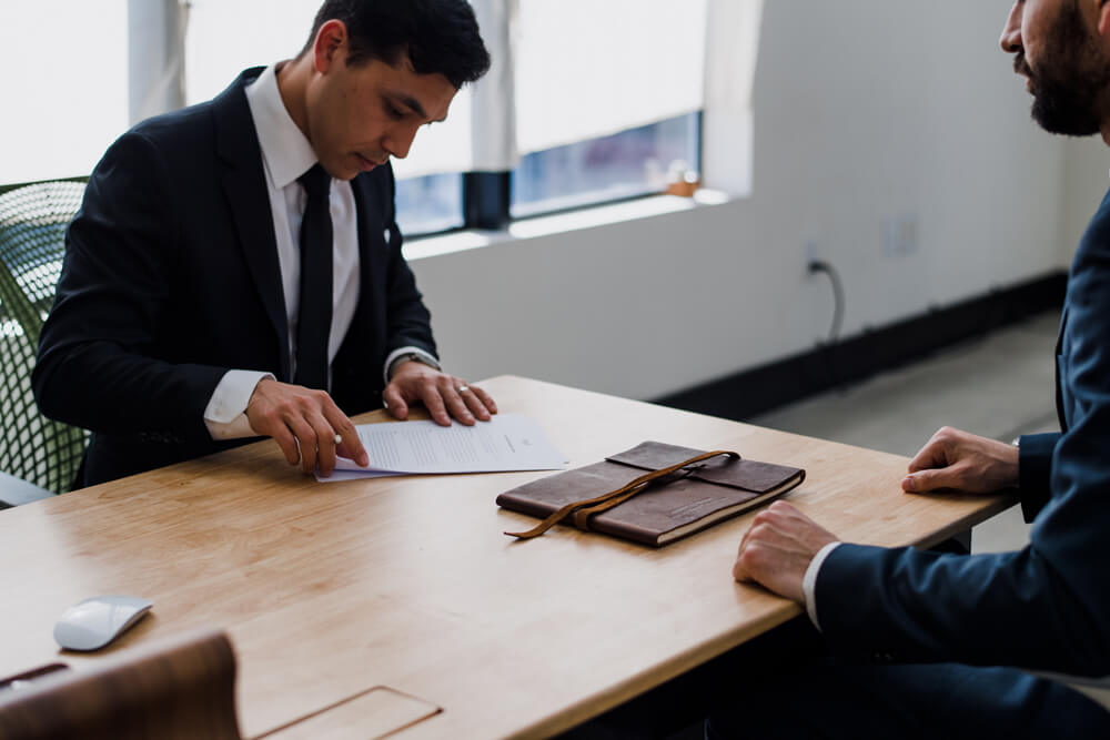 tax consultant at table with client tax consultant at table with client
